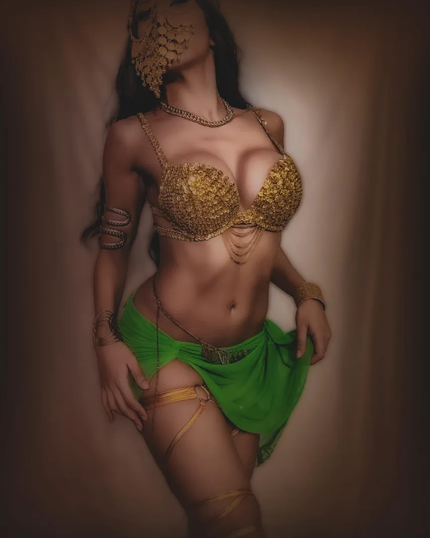 Bare midriff elegance, glowing under warm tones posted by Belladancer_beauty