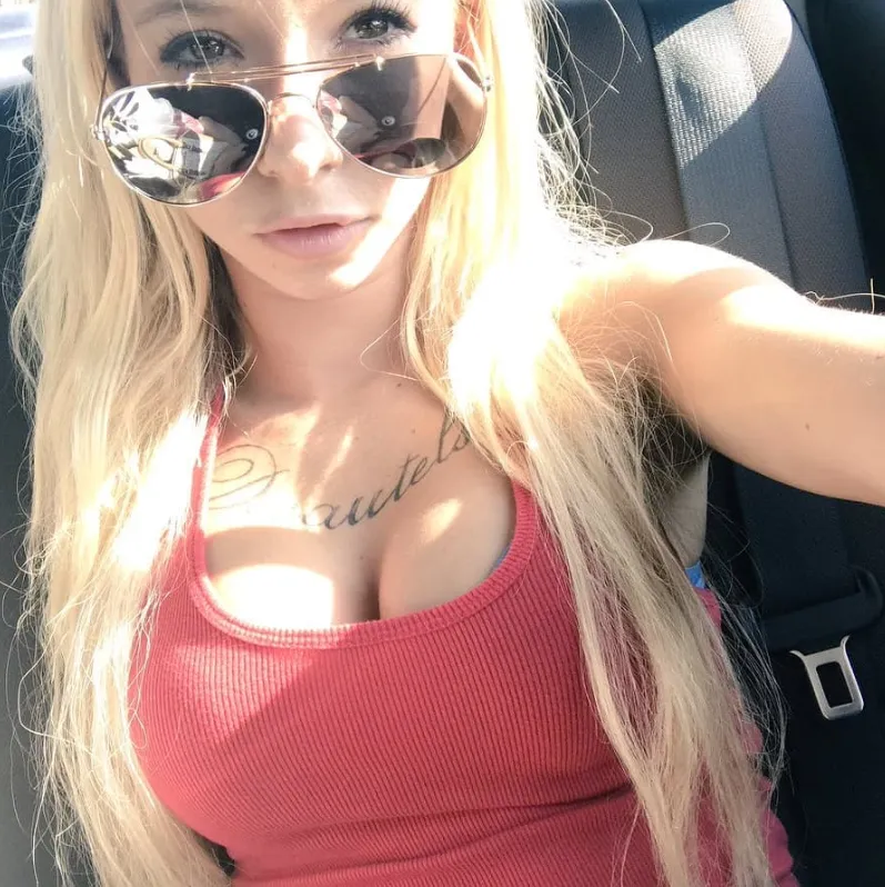 Big fan of her chest tattoo. Any scene recommendation with it shown? posted by Few_Tangerine8836