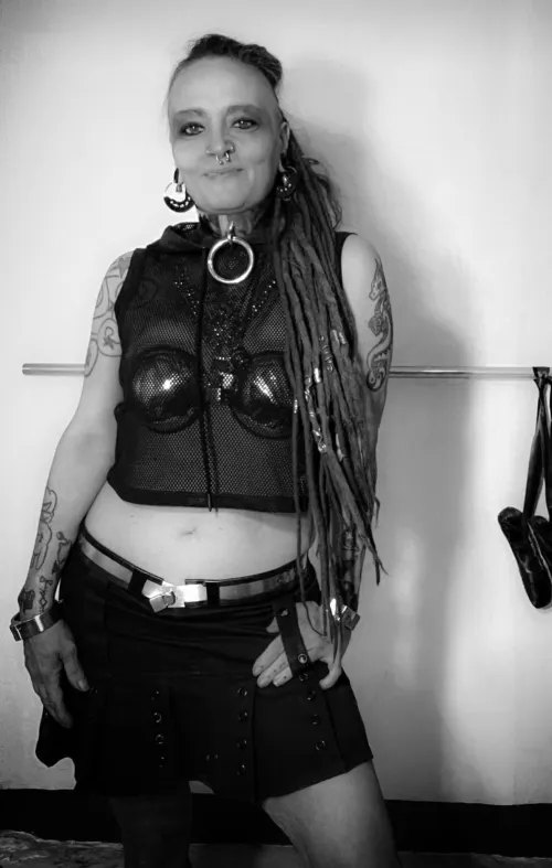 Black, white, and locked tight. My armor, my choice. Keep staring, it's the closest you'll ever get. by MissNekotied