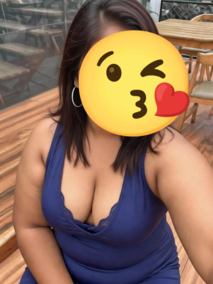 Blue dress, big energy - trying to be the center of attraction in the early evening crowd while hubby went to grab some mocktails Snug fit hugging every inch, plunging neckline daring you to look lower Outdoor glow, red lips, and that “you know you wan posted by Radiant_Apple3034