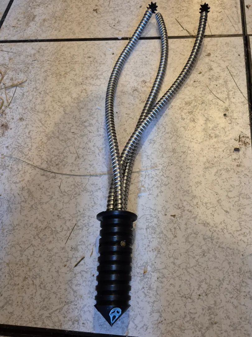 Conduit whip with 3d printed spike ends and handle. posted by SpecialistRecord96