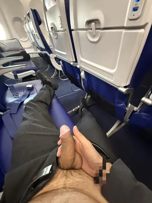 Delayed flight with few people on board means to take that risky pic by NovelR3880