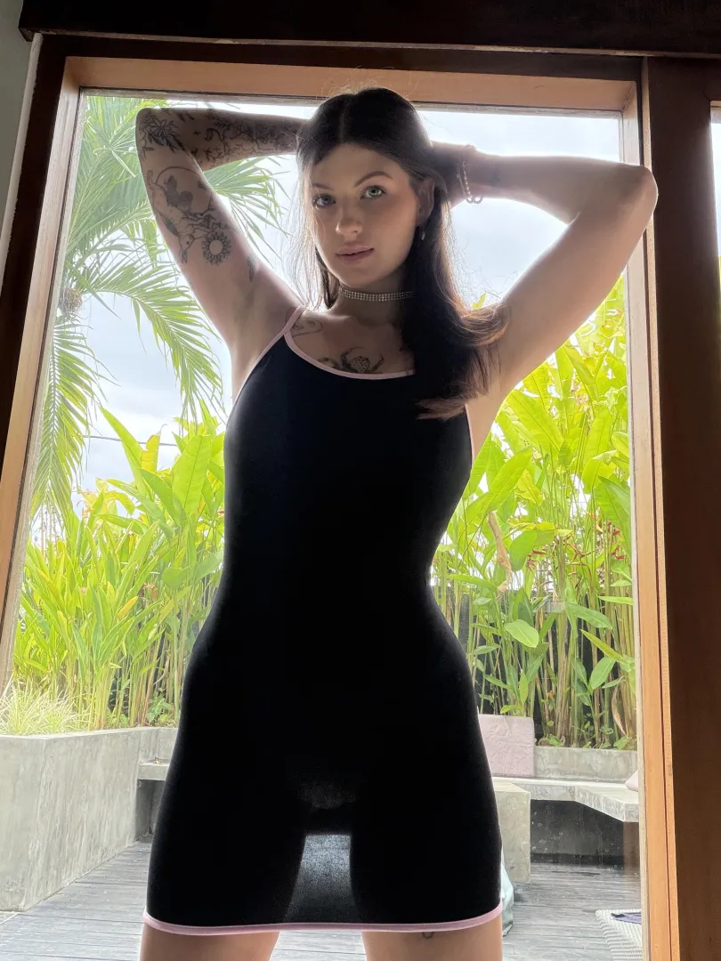 Even a black dress cannot block out the bright sunlight posted by glowdisorder