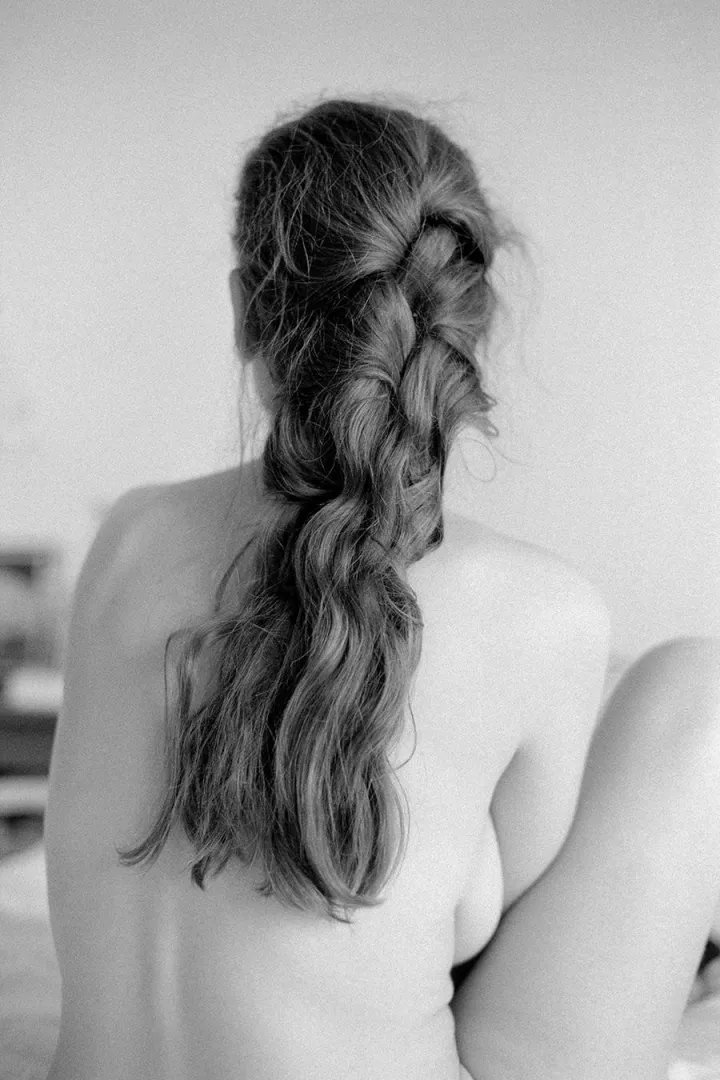 Fanny w/ hair partially untied • Nikon F3, Ilford Delta 400, 50mm f/1.4 posted by mrchill1979