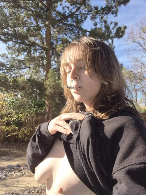 Flashing my tittites outside while smoking a stoge by saraonly420