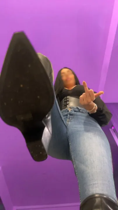 flipping you off while you kiss my boot posted by Alekzandra_Payne