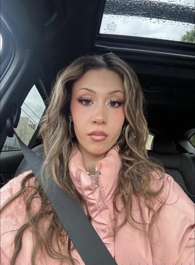 Gorgeous eyes and hoops posted by proudhornyaddict