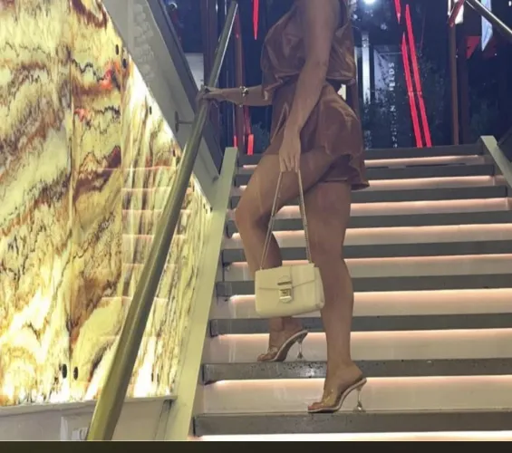 Heels, Legs, Bum, Boobs. What more could a simp want? by LegitimateFlow3076