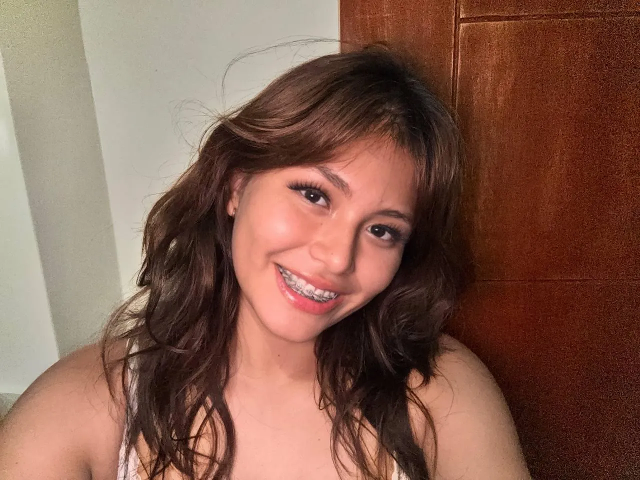 Her unadorned face simply adds to her charm, Revealing a self-assured beauty that requires no embellishment. posted by Novel_Bar_5518