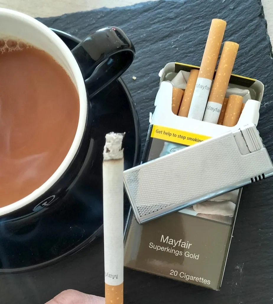 Home after a early start at work starting on my 2nd pack of Mayfair superkings gold and chilling  posted by neighboy28