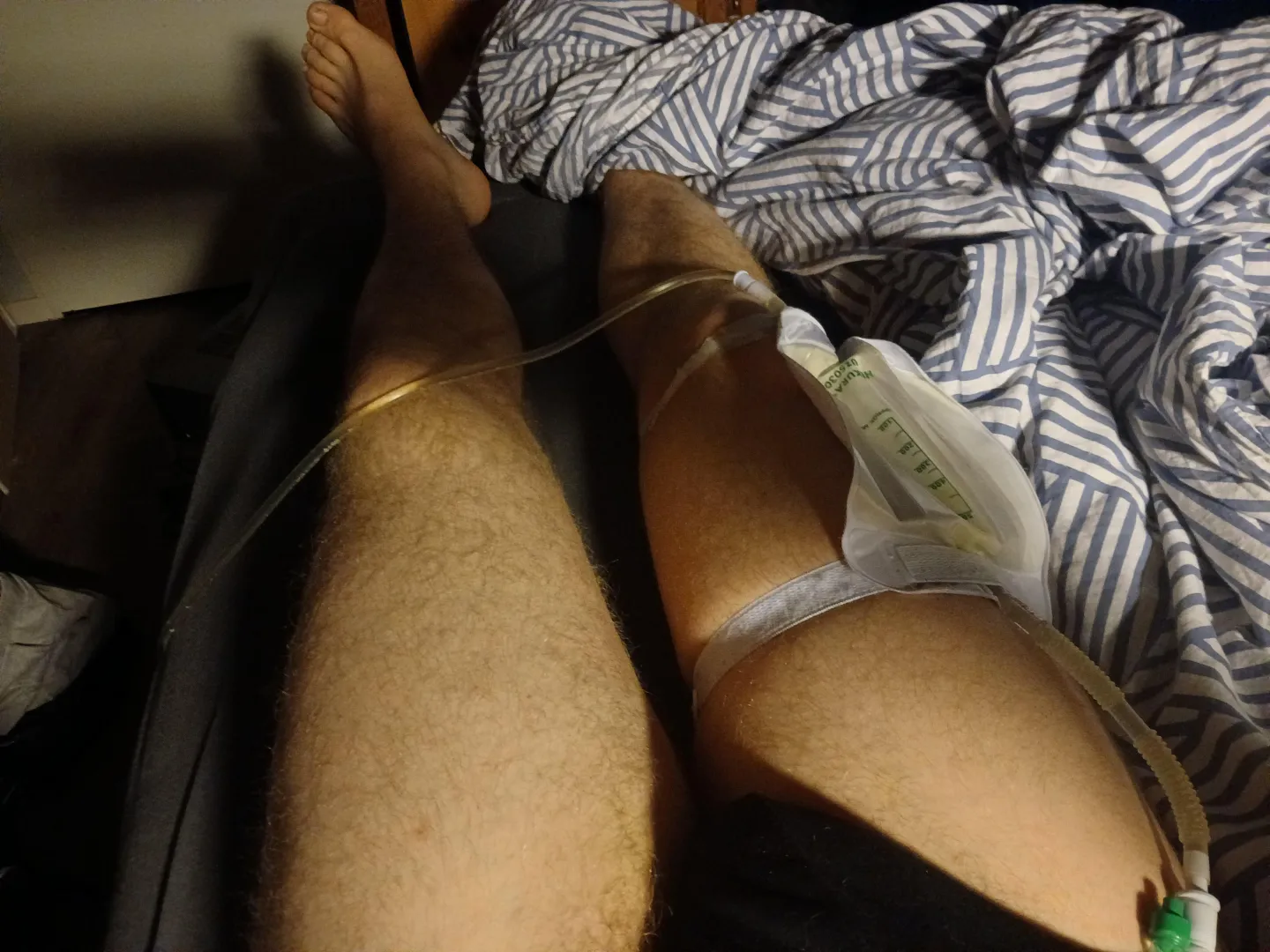 Im bonded to the bed this night al the hoses for the pee collection systeem. Around me and over me posted by baak20001