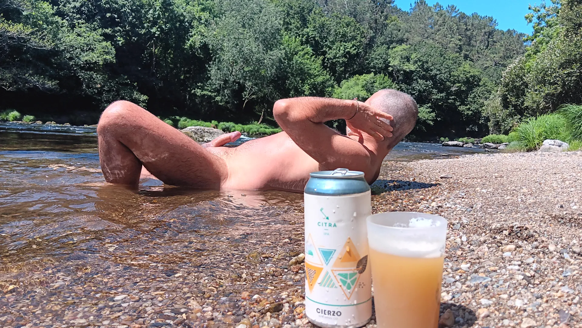 In the river... enjoying the sun, bath & beer posted by nudebodytime