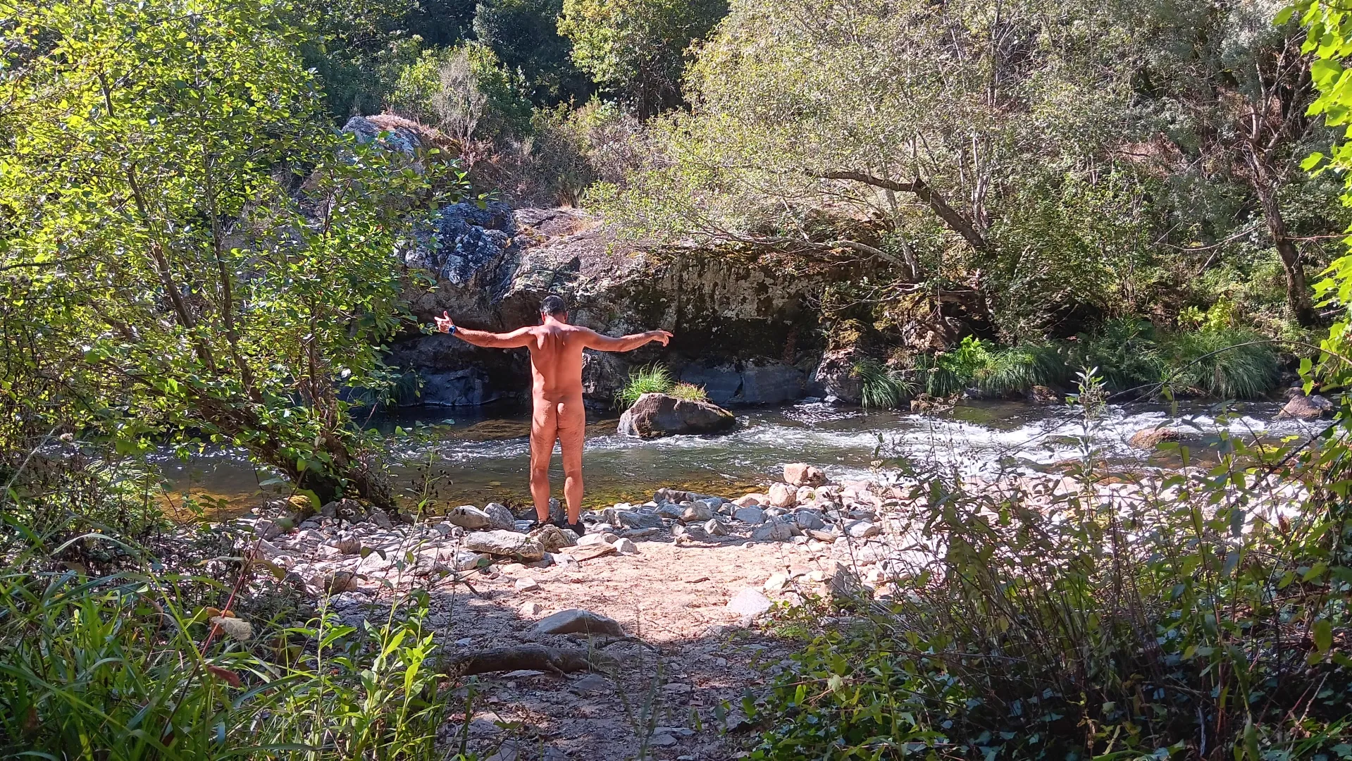 In the river. I take a break to refresh myself posted by nudebodytime