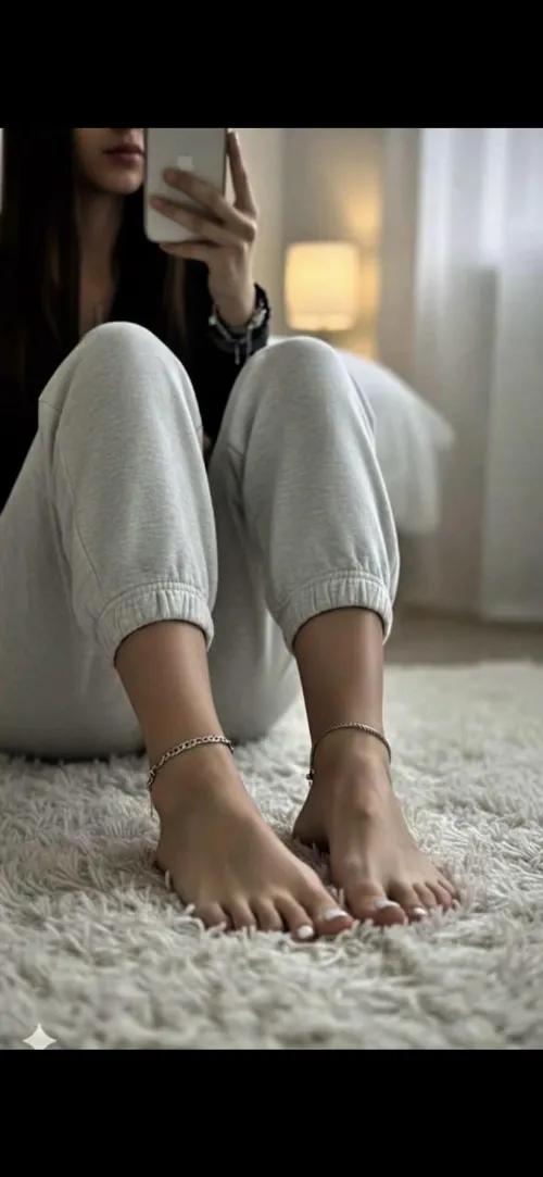 Just feet at home, relaxing by Melanie_Soles