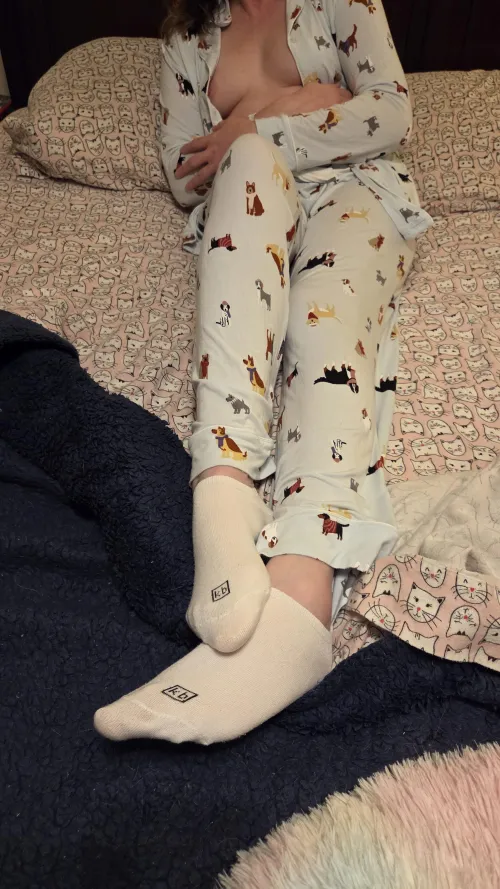 Just relaxing in my pajamas and white kb socks waiting for your cum. Click on the photo to enlarge a surprise by leggingsgirl15