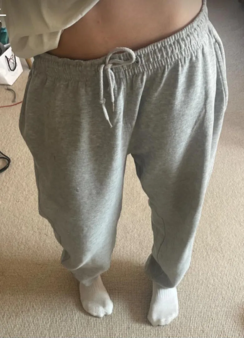 Just trying on some gray joggers. posted by LegitimateAnt3655