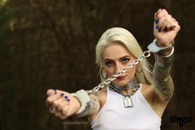 Locked for a walk. 
Would you set me free? by MartaKlintaSteel_