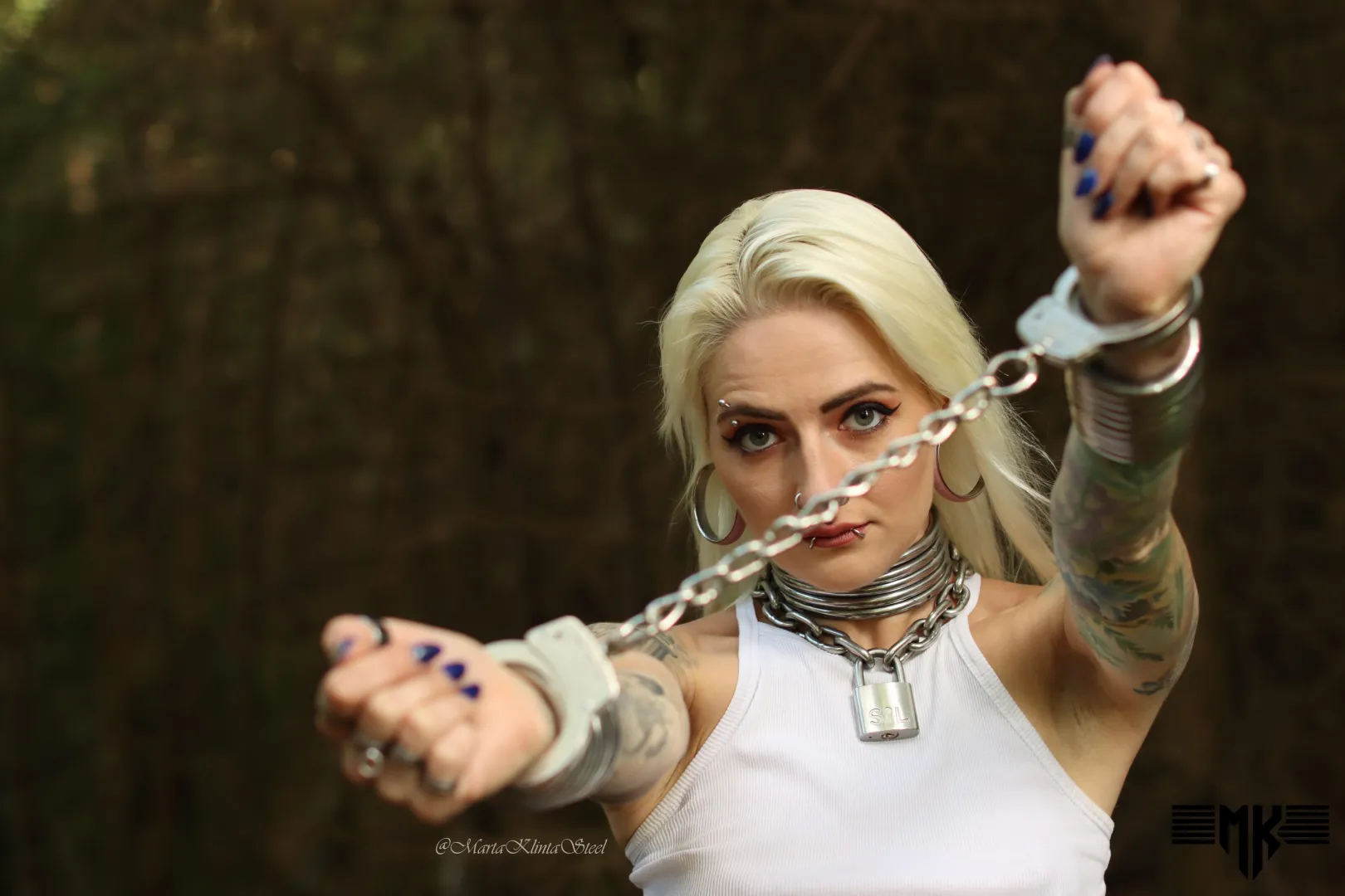 Locked for a walk. 
Would you set me free? posted by MartaKlintaSteel_