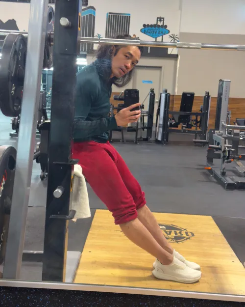 Long Haired Asian Man, Red Joggers, Gym Bulge by jaxsolomon