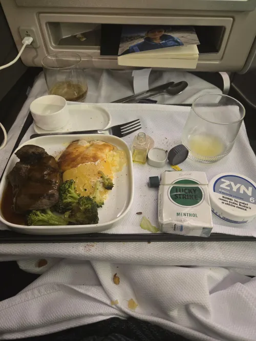 Main Course over the Atlantic. Popped a zyn after dinner. Niccing out for a Lucky by StoopSign