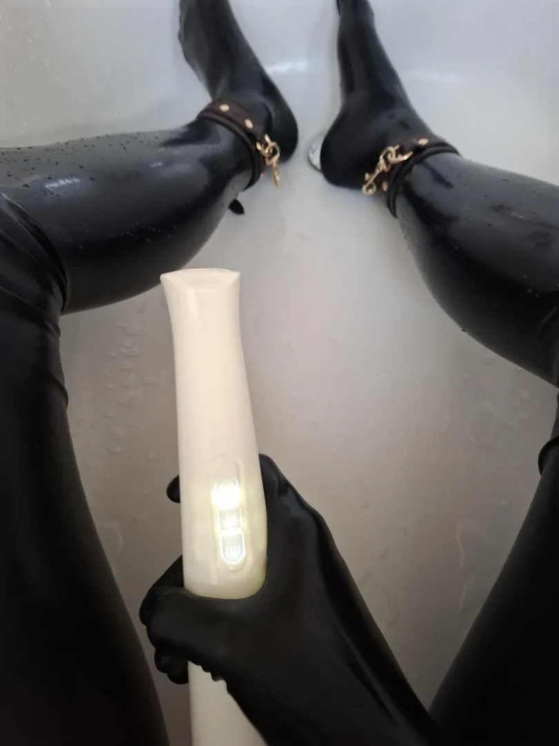 Me and my favorite toy in the bathtub posted by MissLiatex