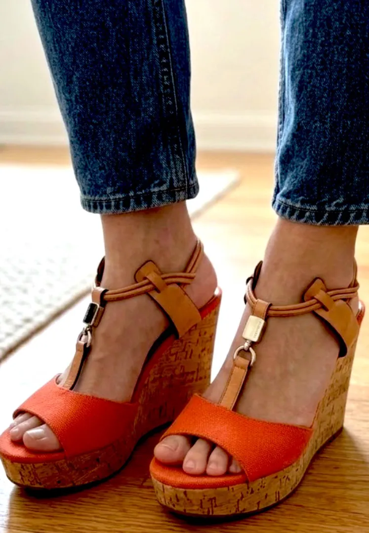 My new Coach wedges. Try not to stain them. posted by CaptainFantastic0211