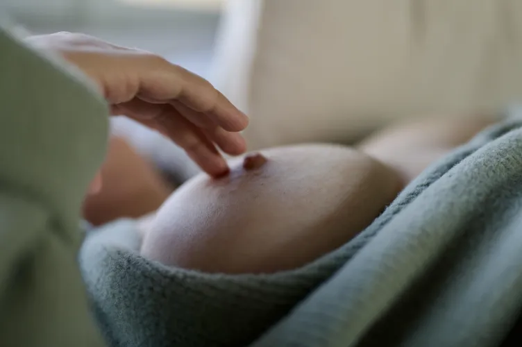 My wife lying back in her green sweater, teasing her hard nipple just for us…  by Final_Hand_7443