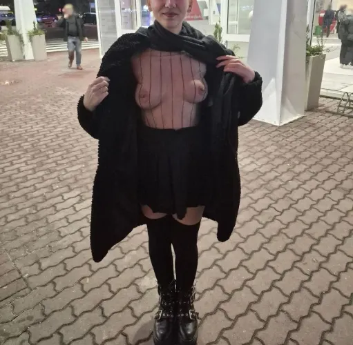 Nothing under the coat but a tiny skirt and sheer top. Flashing tits outside a busy shop on a cold night by Skirt_and_Sin