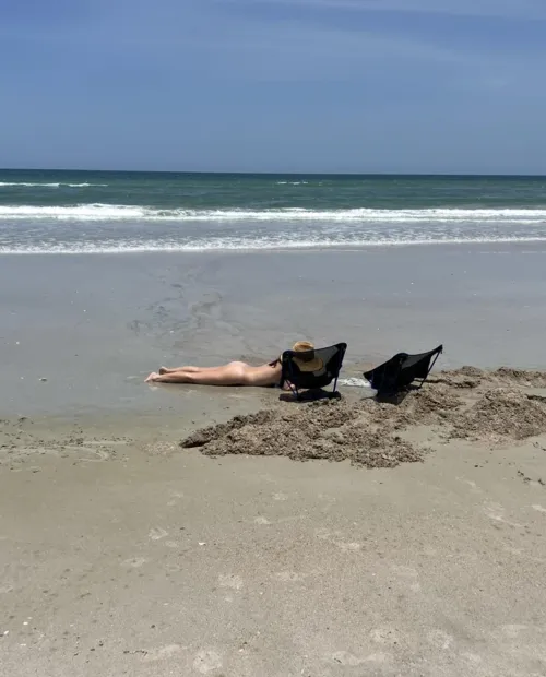 Nude beach sand castle building is the best way. by We-do-what-you-want