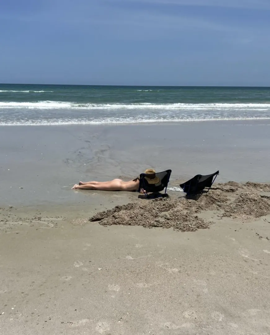 Nude beach sand castle building is the best way. posted by We-do-what-you-want