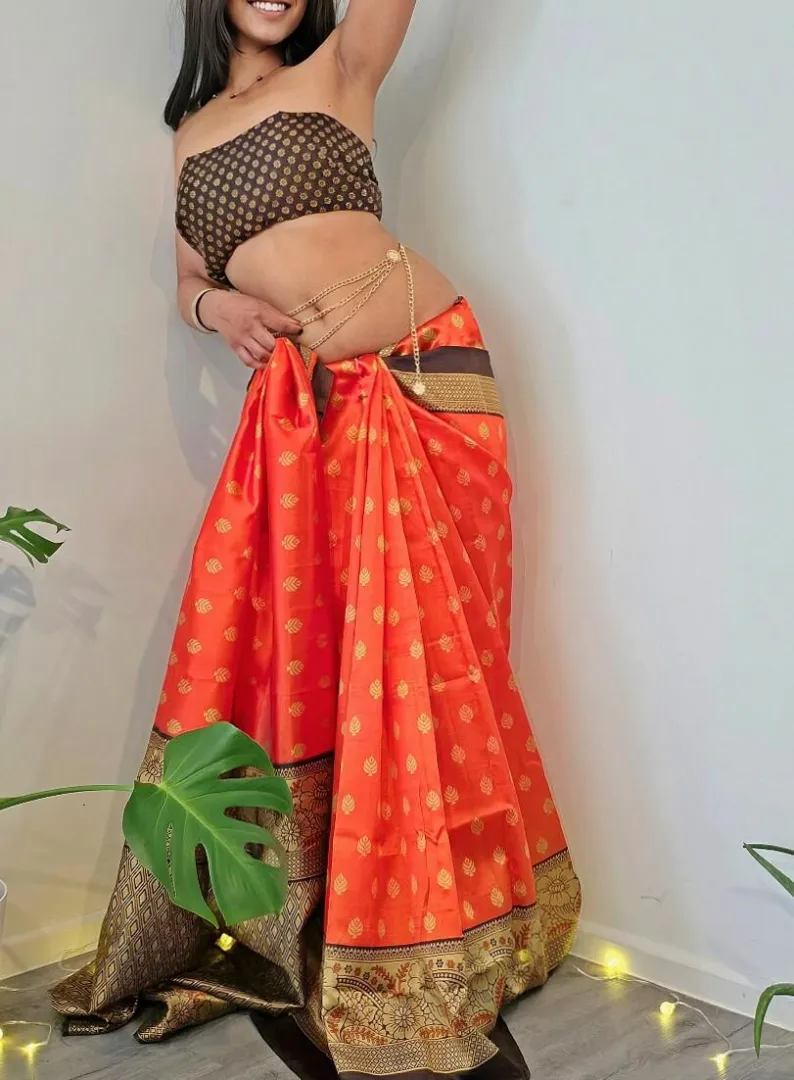 orange silk and a bare midriff. posted by TheEngineerLady