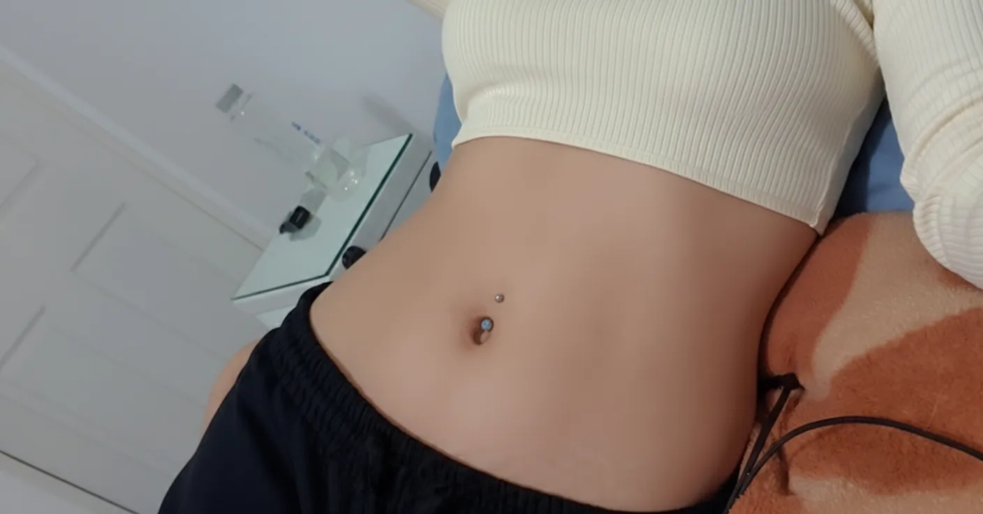 Outfit: cute. Navel ring: cuter.  posted by Mimi__G07