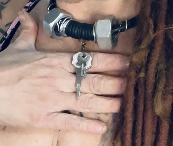 Ownership isn’t loud. It hangs quietly around my neck. posted by MissNekotied