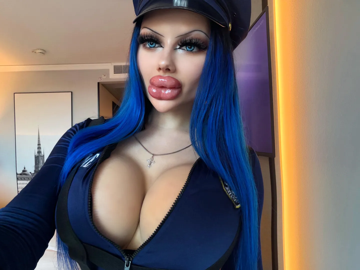 Police doll has just got new bimbo features, guess my new implants size! posted by PurePerfectDoll