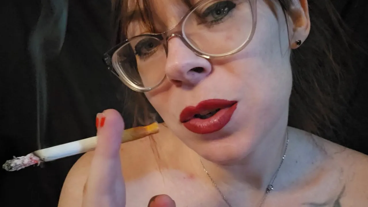 Pretty lips the bite down on the cork, creating the most wonderful drag as I indulge into my smoking addiction posted by MistressThrope