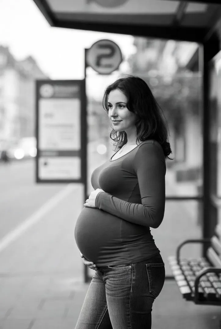 Pretty pregnant woman waiting for the bus posted by phil-1986