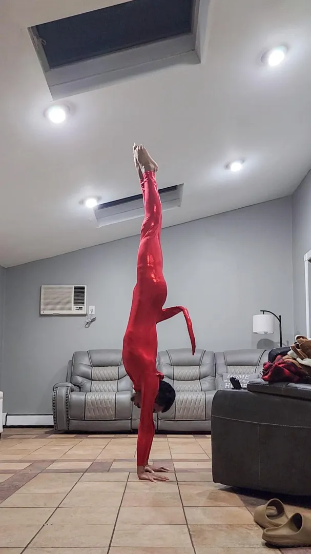 Red circus costume posted by GNSOFFICIAL