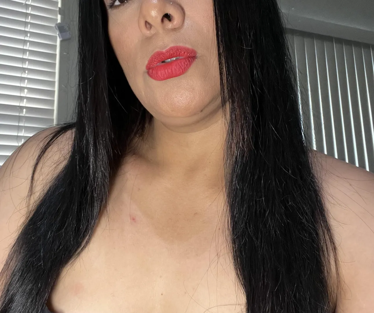 “Red lips, dangerous intentions.” posted by Beautiful-Impact913