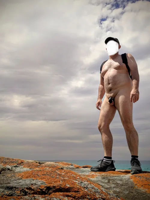 Red rocks and blue balls - hike over the headland by Whynot4fun80