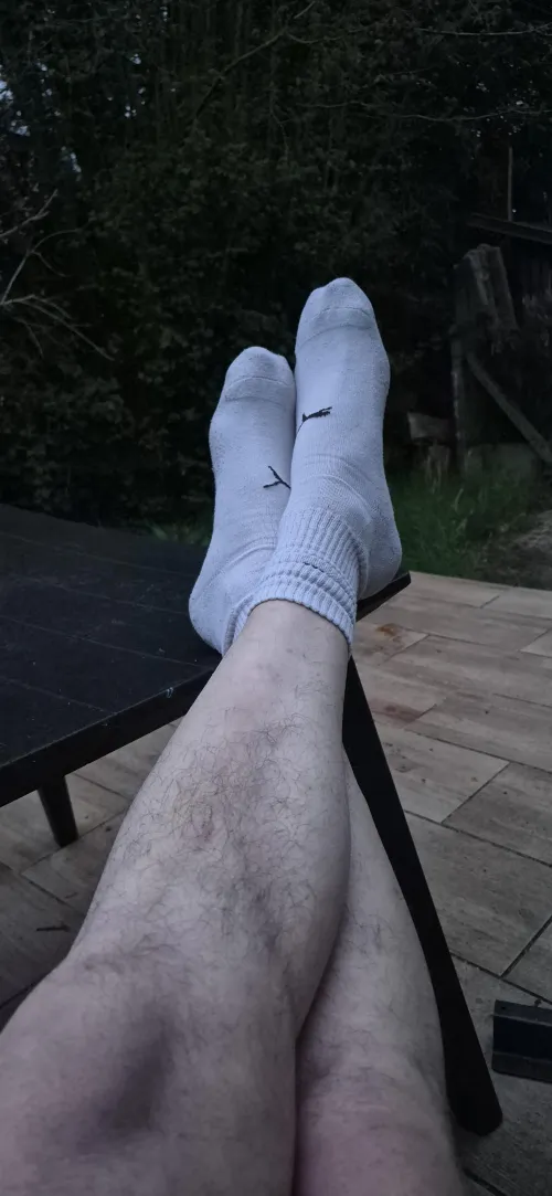 Relaxing outside in my socks… anyone else like white socks? by HairySockDad
