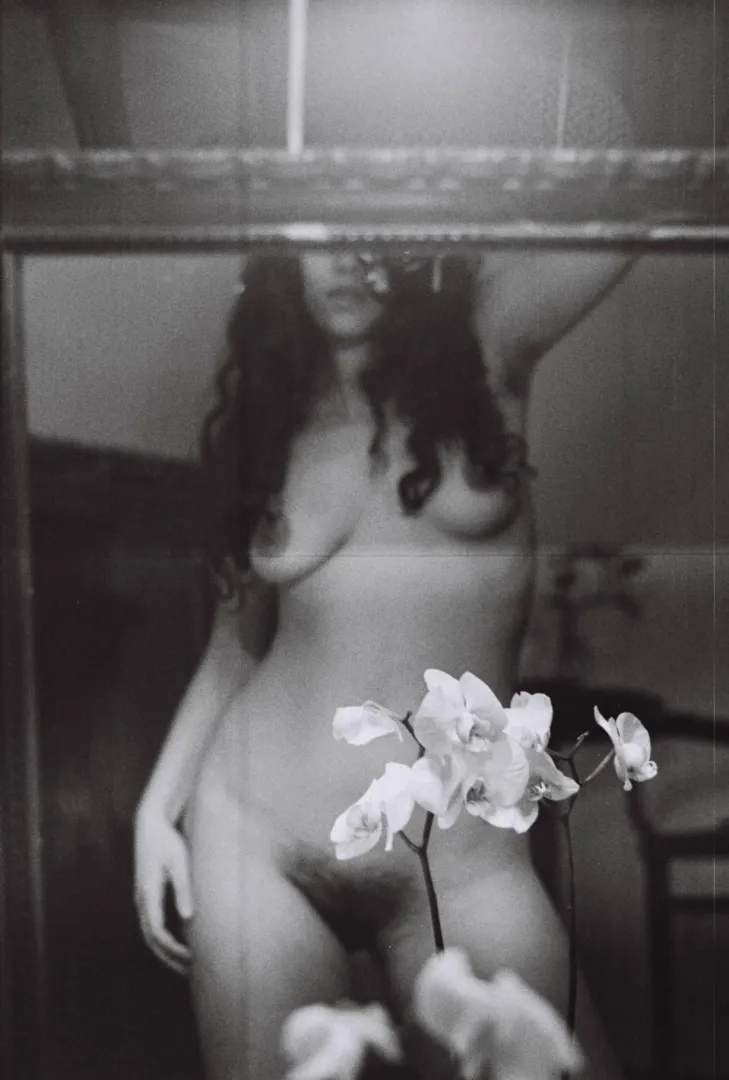 self portrait with orchid posted by aureanymphaea