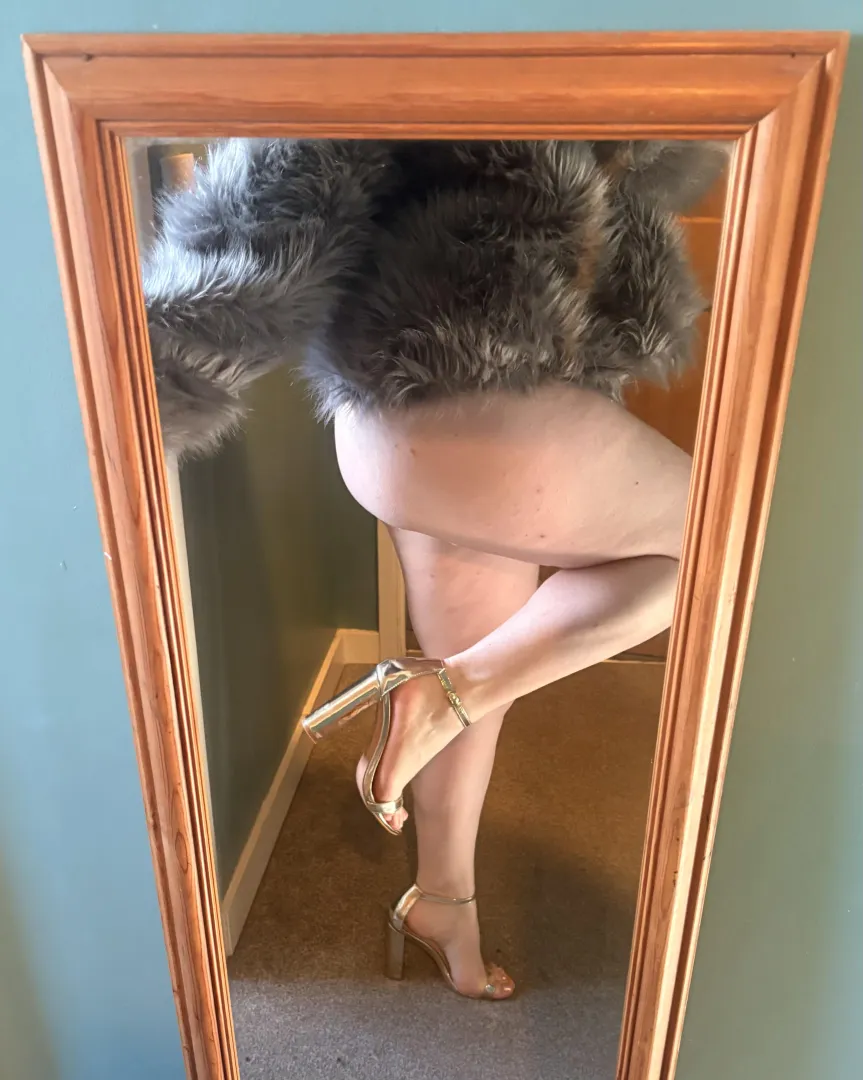 Sexy heels, fluffy coat & nothing underneath posted by Tantilising_tushy