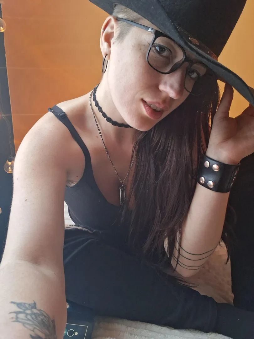 Sexy selfie in my giant hat posted by inked_emma_honey