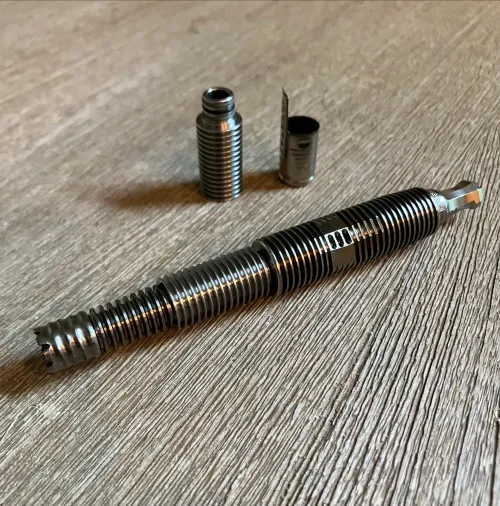 Shell shock silencer mounted on the Spinley. Fins for days by HoboChopShop