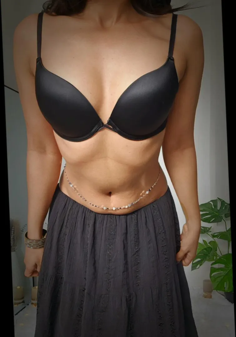 silver chain resting on my bare midriff. posted by TheEngineerLady