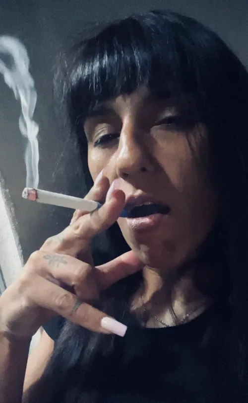 Smoke rising from my sweet lips  by Sashytta_Brunette