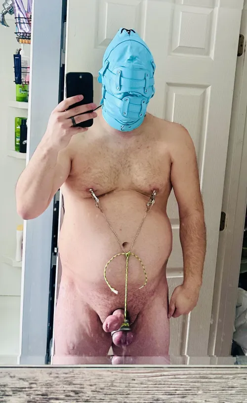 Spent time this morning in some self bondage. I tight my balls to my nipple clamps so that when I moved or laid flat it pulled so tight by Argonaut9999