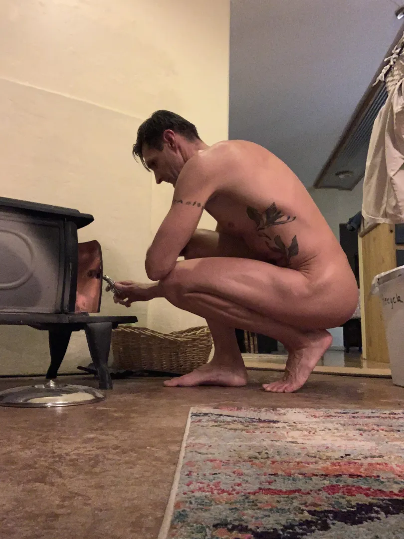 Stoking the fire posted by clothingoptionalNM