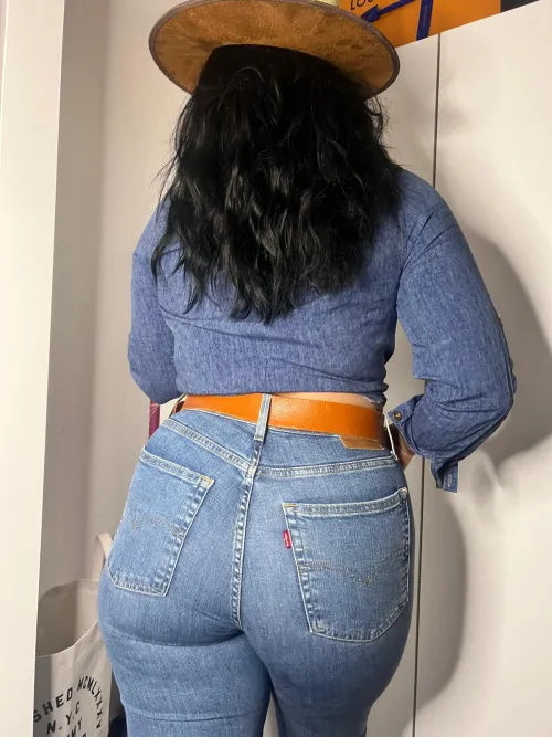 Tanned curves in Levis sparking playful heat the beachs most captivating star by Galadriel69_