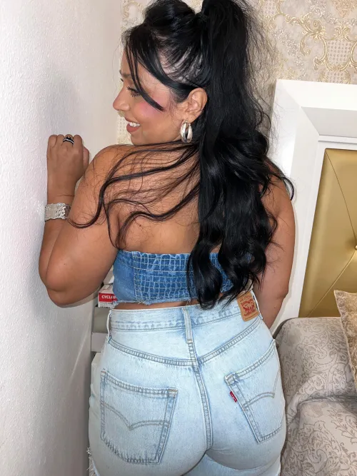 Tanned silhouette in fitted denim radiating bold heat summers sexiest seaside allure by Galadriel69_